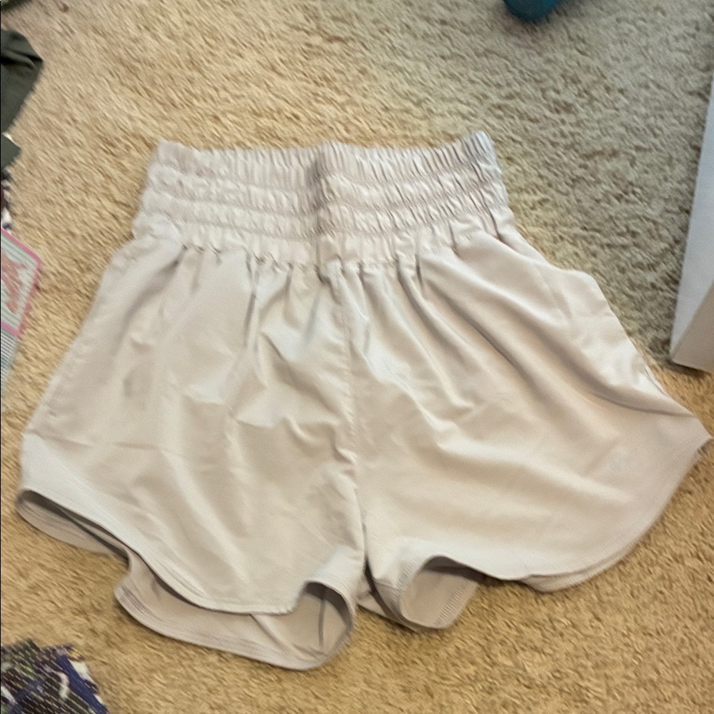 Nike Women's High Waist Light Gray Shorts (size small)